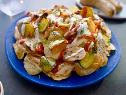 Beauty shot of Molly Yeh's Cheesy Pickle Nachos, as seen on Girl Meets Farm, Season 8.