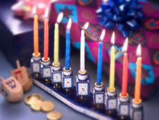 Why do we eat latkes, gelt and jelly doughnuts for eight days and nights? Here, everything you need to know about traditional Hanukkah food.