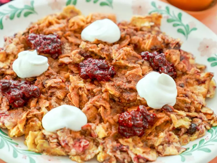Beauty shot of Molly Yeh's Mixed Berry Matzo Brei, as seen on Girl Meets Farm, season 10.
