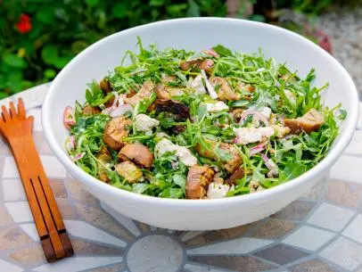 Host Michael Symon's Arugula and Fresh Mozzarella Salad, as seen on Symon's Dinners Cooking Out, Season 3.