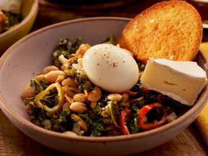 Beauty shot of Molly Yeh's Beans and Greens with Runny Egg, as seen on Girl Meets Farm, Season 11.