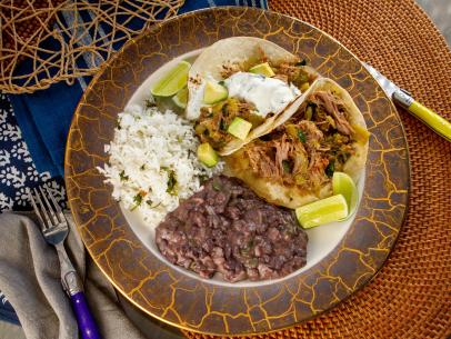 Antonia Lofaso’s Braised Pork Shoulder with Hatch Chiles, as seen on Guy's Ranch Kitchen Season 6.