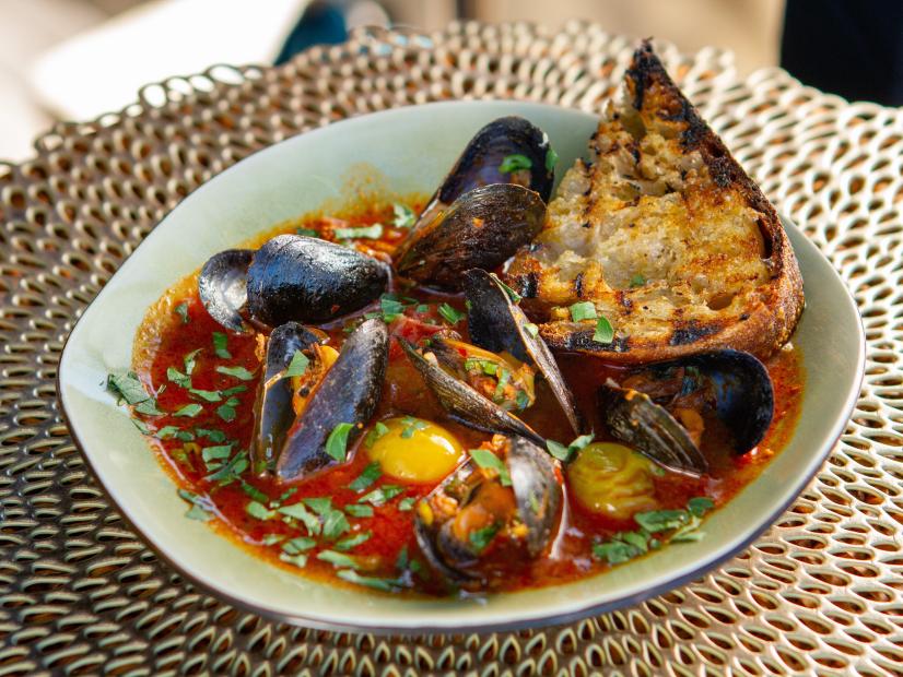 Brooke Williamson’s Steamed Mussels with Chorizo, Tomatoes and Crusty Bread, as seen on Guy’s Ranch Kitchen Season 6.