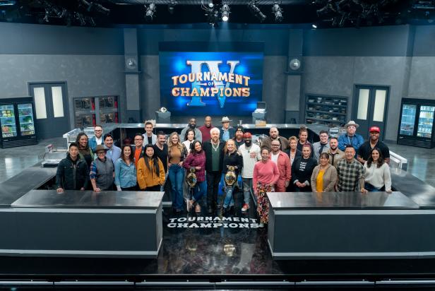 Host Guy Fieri with contestants Shota Nakajima, Tiffany Derry, Ilan Hall, Crista Luedtke, Jose Garces, Tracey Shepos Cenami, Viet Pham, Carlos Anthony, Mei Lin, Joe Sasto, Kelsey Barnard Clark, Maneet Chauhan, Shirley Chung, Eric Adjepong, Madison Cowan, Tiffani Faison, Jonathon Sawyer, Brian Malarkey, Tobias Dorzon, Stephanie Izard, Nate Appleman, Christian Petroni, Elizabeth Falkner, Karen Aukowicz, Antonia Lofaso, Britt Rescigno, Lee Anne Wong, Adam Sobel, Jet Tila, Graham Elliot, Darnell Ferguson, and Leah Cohen, as seen on Tournament of Champions, Season 4.