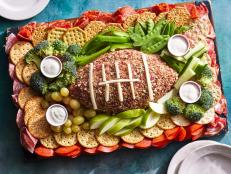 This fun board will feed the whole team and then some. You can prep the fruit and vegetables and make the cheeseball earlier in the day so all you have to do is put everything together on the board before the big game.