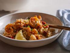 Inspired by Spanish garlic shrimp, this ultra-simple dish is cooked entirely in a rice cooker. It’s boosted with the smoky flavors of chorizo and paprika, then rounded out with crunchy red peppers and a bright squeeze of lemon at the end.