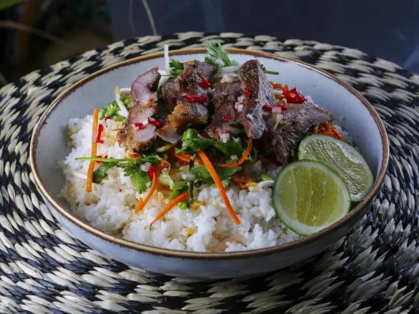 Jet Tila’s Vietnamese Pork Chop over Broken Rice, as seen on Guy's Ranch Kitchen.