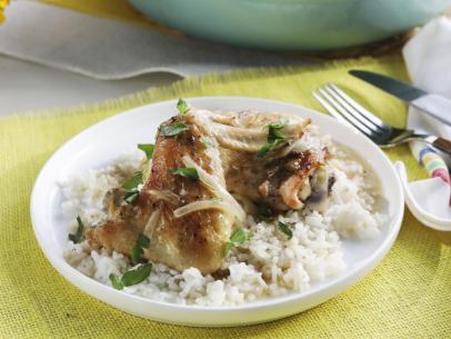 Kardea Brown's Braised Chicken with Onion Pan Gravy over white rice.