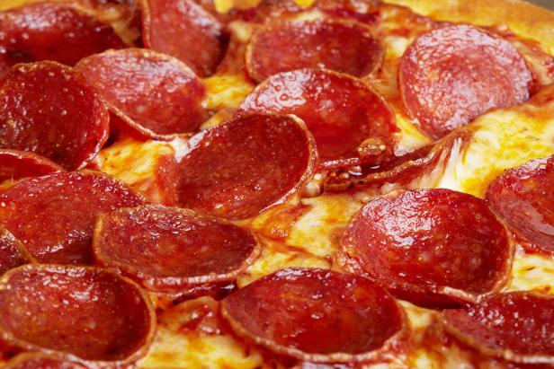 Closeup of Pepperoni pizza as a background