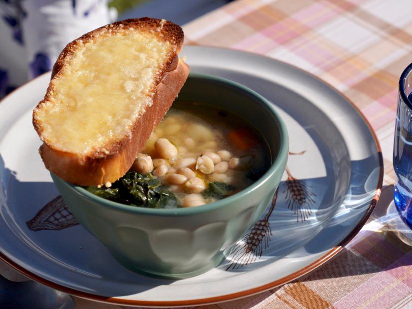 Beauty shot of Molly Yeh's Bean Soup with Challah Crouton, as seen on Girl Meets Farm Season 12.
