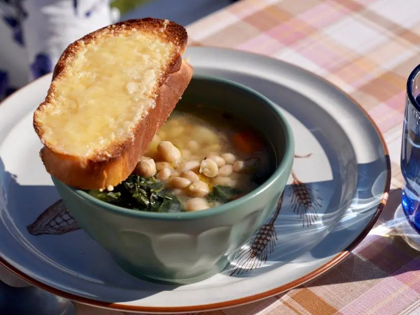 Beauty shot of Molly Yeh's Bean Soup with Challah Crouton, as seen on Girl Meets Farm Season 12.