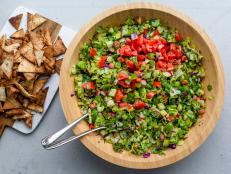 I love my mom’s quintessential Lebanese fattoush recipe, but TikTok got me thinking — could I modernize the dish by finely chopping it and serving it with with pita chips for scooping? Definitely.