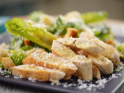 Alex Guarnaschelli's Chicken Caesar Salad Beauty, as seen on The Kitchen, Season 33.