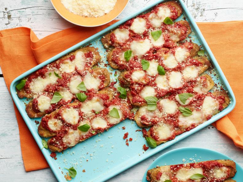 Food Network Kitchen’s Sheet Pan Zucchini Parmesan as seen on Food Network.