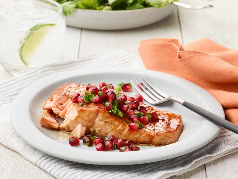 Food Network Kitchen’s Air Fryer Pomegranate Glazed Salmon as seen on Food Network.