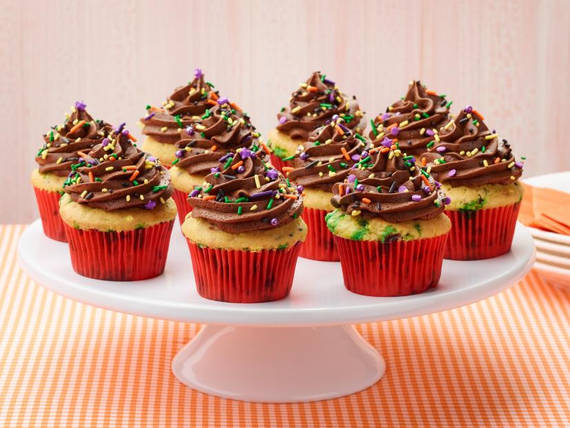 Food Network Kitchen’s Halloween Confetti Cupcakes as seen on Food Network.