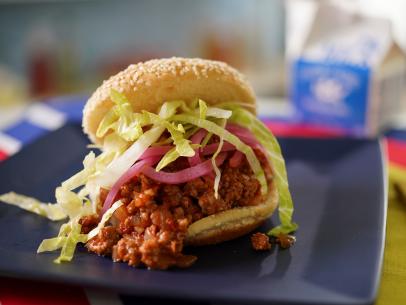 Alex Guarnaschelli's Pork Sloppy Joes with Pickled Onions Beauty, as seen on The Kitchen, Season 34. 