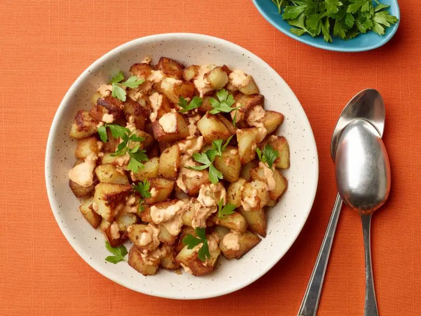 Bobby Flay's Patatas Bravas Home Fries with Roasted Tomato Aioli for the Siesta Fiesta episode of Brunch @ Bobby's, as seen on Food Network.
