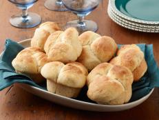 Bake your own yeasty, buttery and golden Homemade Dinner Rolls with Food Network's easy recipe.