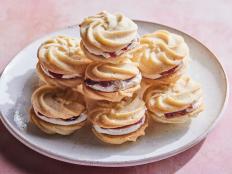 With their beautiful, swirled tops and vibrant filling, these Viennese whirls are sure to look divine on any holiday cookie platter. Despite their name, the delicate, buttery shortbread cookies are a favorite sweet treat in England. They’re sandwiched with a homemade vanilla bean buttercream and a spoonful of raspberry jam, which is traditional, but feel free to substitute with your favorite jam.