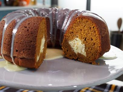 Alex Guarnaschelli's Pumpkin Bundt Cake with White Chocolate Glaze, as seen on The Kitchen, Season 34.