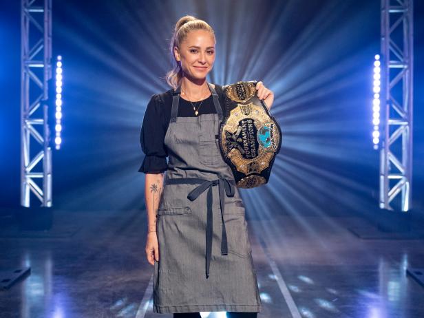 Contestant Brooke Williamson with her 2020 Tournament of Champions Belt, as seen on Tournament of Champions, Season 5.