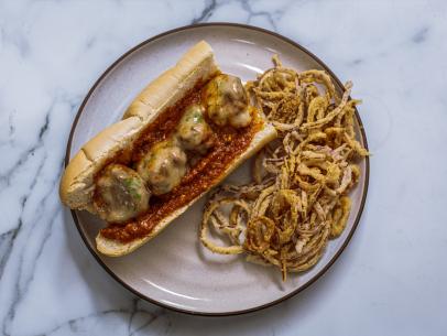 Close-up of Rustic Meatball Subs and Fried Red Onions, as seen on The Pioneer Woman, Season 36