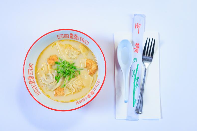 Host Selena Gomez and Chef Shirley Chung's dish "Nai Nai’s Dumpling Soup", as seen on Selena + Restaurant, Season 1.
