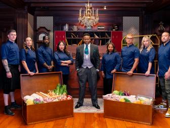 Host Tituss Burgess with contestants Graham Campbell, Gabriella Baldwin, Tobias Dorzon, Nini Nguyen, Aarthi Sampath, Byron Gomez, Brittany Anderson, and Kevin Lee, as seen on Last Bite Hotel, Season 1.