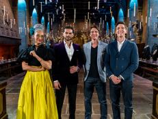 Judges Carla Hall and Jozef Youssef with Hosts James and Oliver Phelps in The Great Hall, as seen on Harry Potter: Wizards of Baking, Season 1.