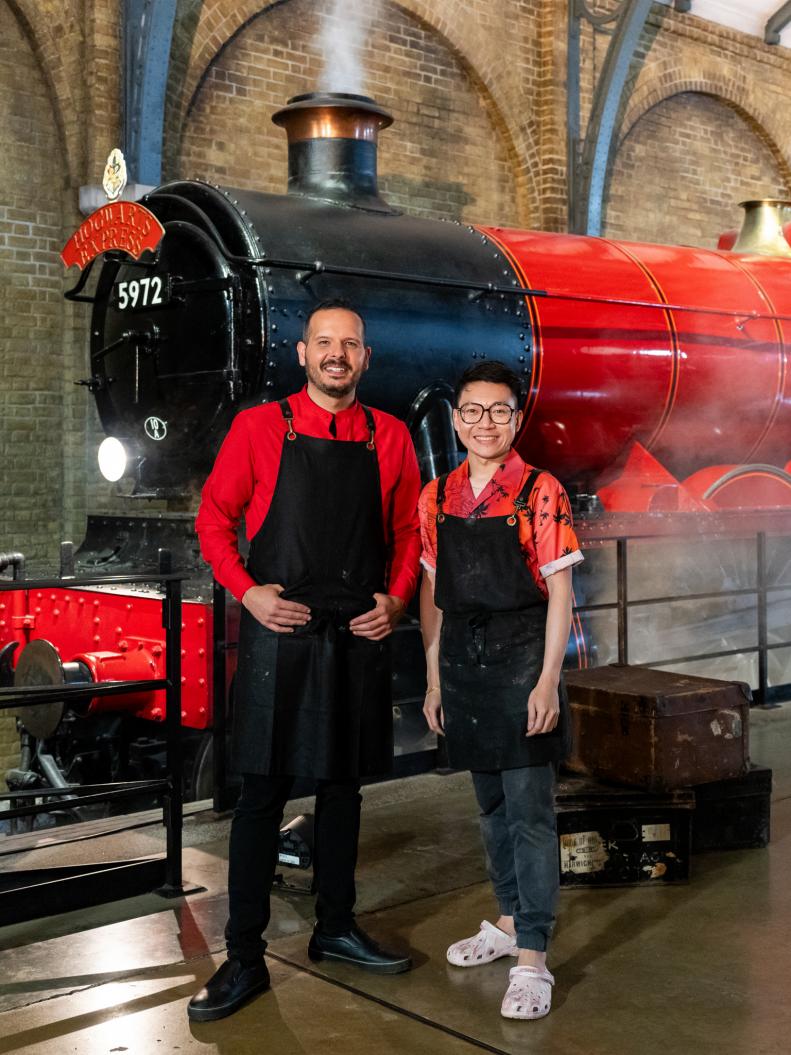Contestants Chris Teixeira and Miko Kaw Hok Uy, as seen on Harry Potter: Wizards of Baking, Season 1.