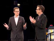 Guest judge Chef Bobby Flay, left, and Host Ted Allen, right, stand on the catwalk, prior to the start of the seventh round of competition, as seen on Food Network's America's Best Cook, Season 1.