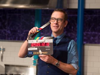 Host Ted Allen with the audio slate, as seen on Food Network's Chopped Junior, Season 1.
