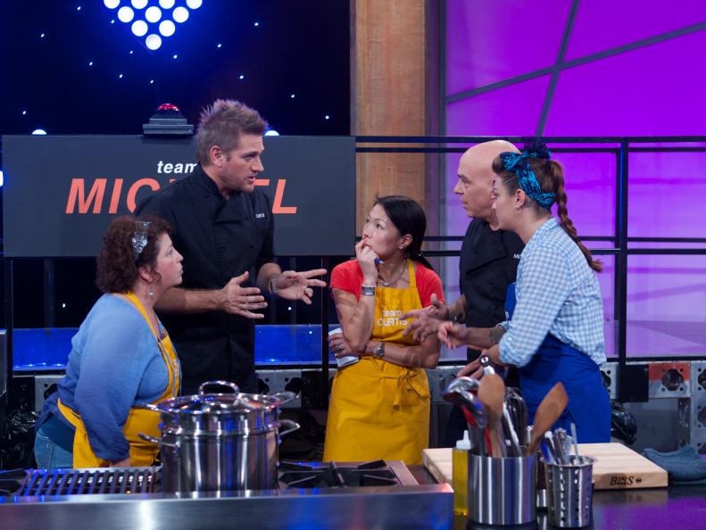 Cook Sharon Damante (L), Chef Curtis Stone, Mimi Turbitt Chang, Chef Michael Symon and Vanessa Craig during the mentoring of the first challenge, Team Michael & Team Curtis vs Team Bobby & Team Alex, three course meal, as seen on Food Network's All-Star Academy, Season 1.