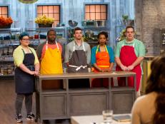 Contestants stand before the judges during the "Desserts on Sticks" pre-heat challenge, as seen on Food Network's Spring Baking Championship, Season 1.