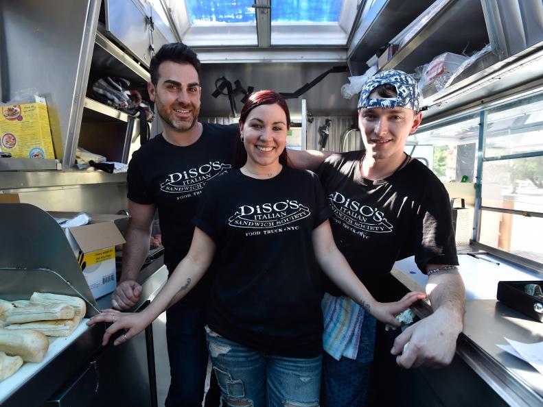 Adam Disilvestro, Dana McKiernan and Benny Chodan of team Diso's Italian Sandwich Society at Lake Havasu, Arizona as seen on Food Networkâ  s The Great Food Truck Race, Season 6.