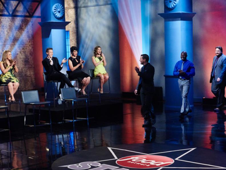 Finalists Dom Tesoriero, Eddie Jackson and Jay Ducote walk out onto set during the finale, as seen on Food Network Star, Season 11.