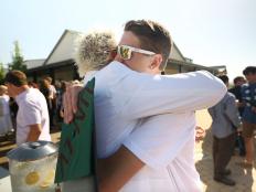 Hunter Fieri hugging his dad, Guy Fieri at his high school graduation as seen in Food Network's Guy's European Vacation episode 1.