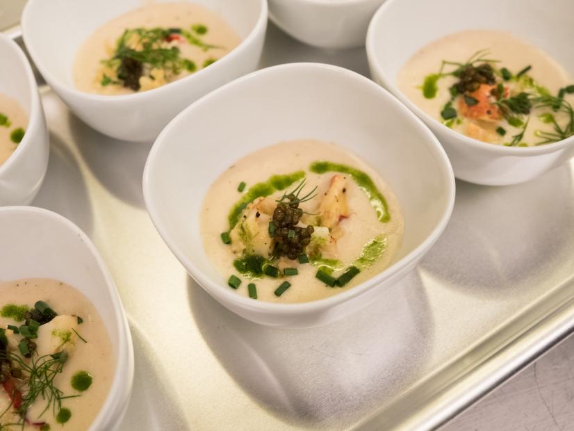 Contestant Cory Bahr's dish Lobster Veloute with Chilled Lobster Salad and Caviar for the Star Challenge Be Our Guest!, as seen on Food Network Star, Season 13.