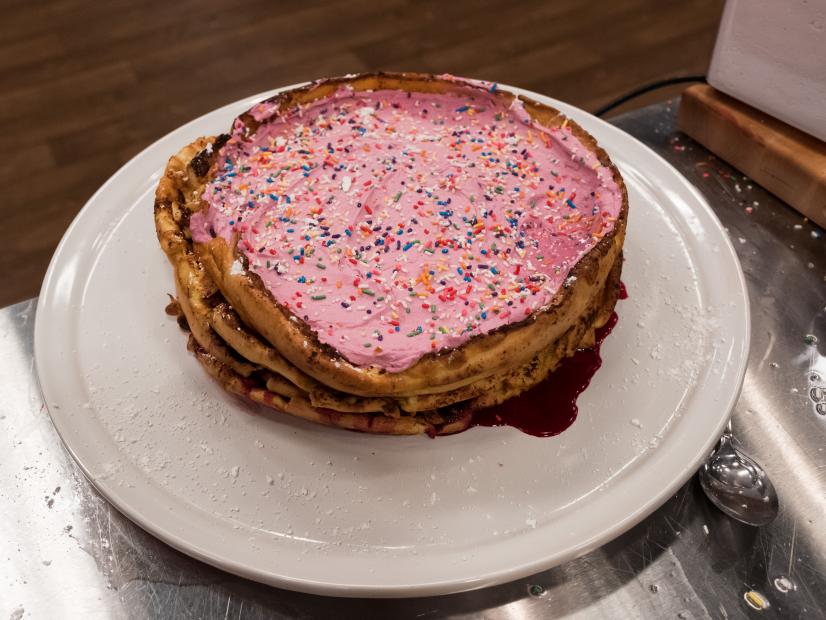 Contestant Amy Pottinger's dish, Giant Rainbow Dutch Babies, for the Mentor Challenge Ginormous Food, as seen on Food Network Star, Season 13.