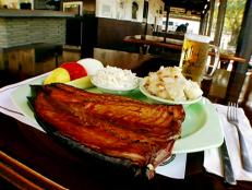 <p>Alton's favorite smoked fish isn't necessarily business in the front and party in the back. Instead, at Ted Peters Famous Smokehouse, the mullet, smoked in red oak, simply tastes like heaven. Guy visited, too, witnessing the 56-year-old method for making the legendary mahi-mullet fish spread.</p>