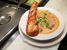 <p>Join Guy at the Silver Gulch Brewery in Fox, AK, the Northernmost brewery in the country. The restaurant serves everything from sandwiches to salads to pizzas in a friendly, casual atmosphere. Try the Porter Beer Cheese Soup.</p>