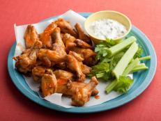 Yes, there's actually a right way to eat a chicken wing and I promise it will make your whole perspective on eating a wing a whole lot easier.