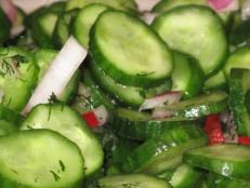 Healthy and family-friendly! This light cucumber salad makes a great side for barbecue fare and is easy to tote along for a picnic.