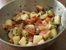 I’m just starting to see early varieties of potatoes at the farmers market and potato salad recipes are calling out to me! This picnic and barbecue fave is known to be heavy on the fat and calories, but it doesn’t have to be. Here are my favorite ways to lighten up this summertime classic.