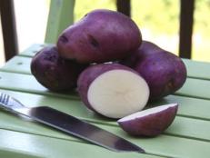 Potatoes already? Spuds may seem like a fall goodie, but young varieties have started showing up at markets now. This early maturing variety (named “Caribe”) is a real summer treat -- their bright purple skin always makes me smile.