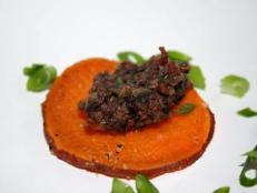 Easy, tasty, seasonal and festive – tote along this black and orange appetizer to your next holiday party.