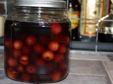 You may think of drying, canning or jam making to preserve fresh fruit – how about soaking up some alcohol?