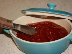 When I have a surplus of tomatoes from my CSA, garden and trips to the farmers’ market, it’s time to make a batch of finger-licking tomato jam.It’s spicy, it’s sweet and  it’s pretty irresistible. Spread it on sandwiches, whisk into salad dressing, or serve with crackers and some sharp cheddar cheese.