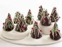 FNK MOIST CHOCOLATE CAKE XMAS TREESFood Network KitchenFood NetworkSugar, AllPurposeFlour, Cocoa Powder, Baking Powder, Baking Soda, Salt, Eggs, Milk,Vegetable Oil, Vanilla Extract, Semisweet Chocolate, White Chocolate, Red and Green MiniCandy Covered Chocolates, Silver Dragee